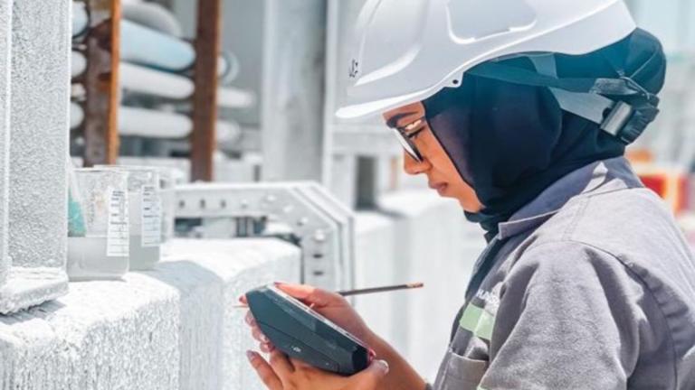 Harsco Environmental woman in hard hat